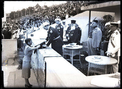 Majestățile Sale, Regele Carol al II-lea și Mare Voievod de Alba Iulia Mihai, participă la festivitățile dedicate Zilei Restaurației pe Stadion O.N.E.F.